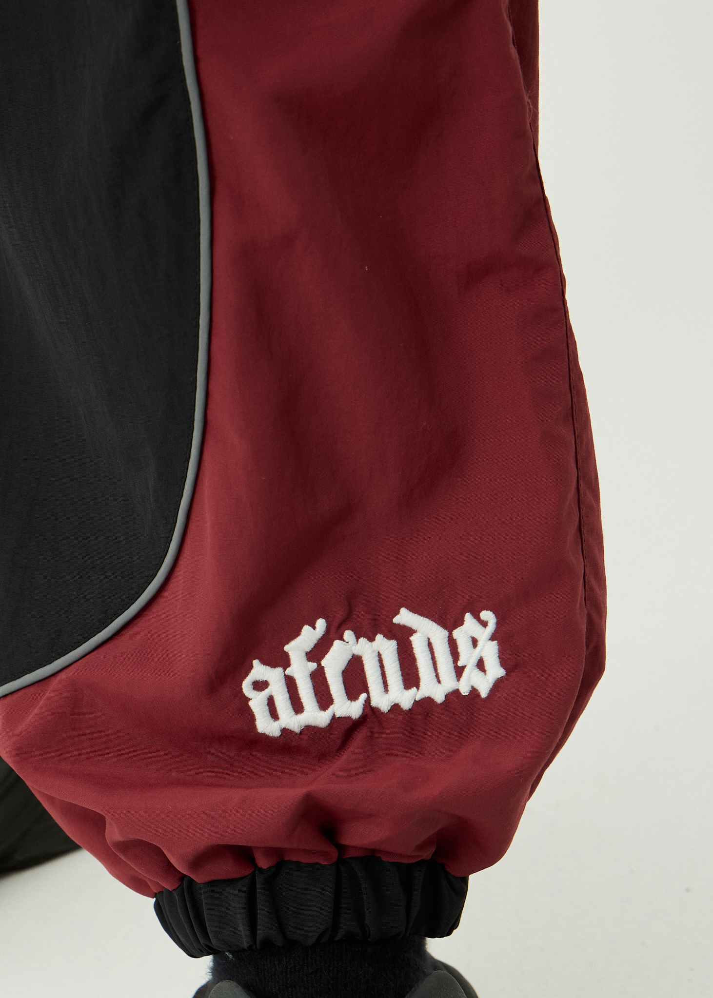 AFENDS Mens Sporting - Recycled Panelled Track Pant - Burgundy