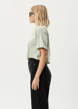 AFENDS Womens Restless Slay Cropped -  T-Shirt - Eucalyptus - Afends womens restless slay cropped    t shirt   eucalyptus 